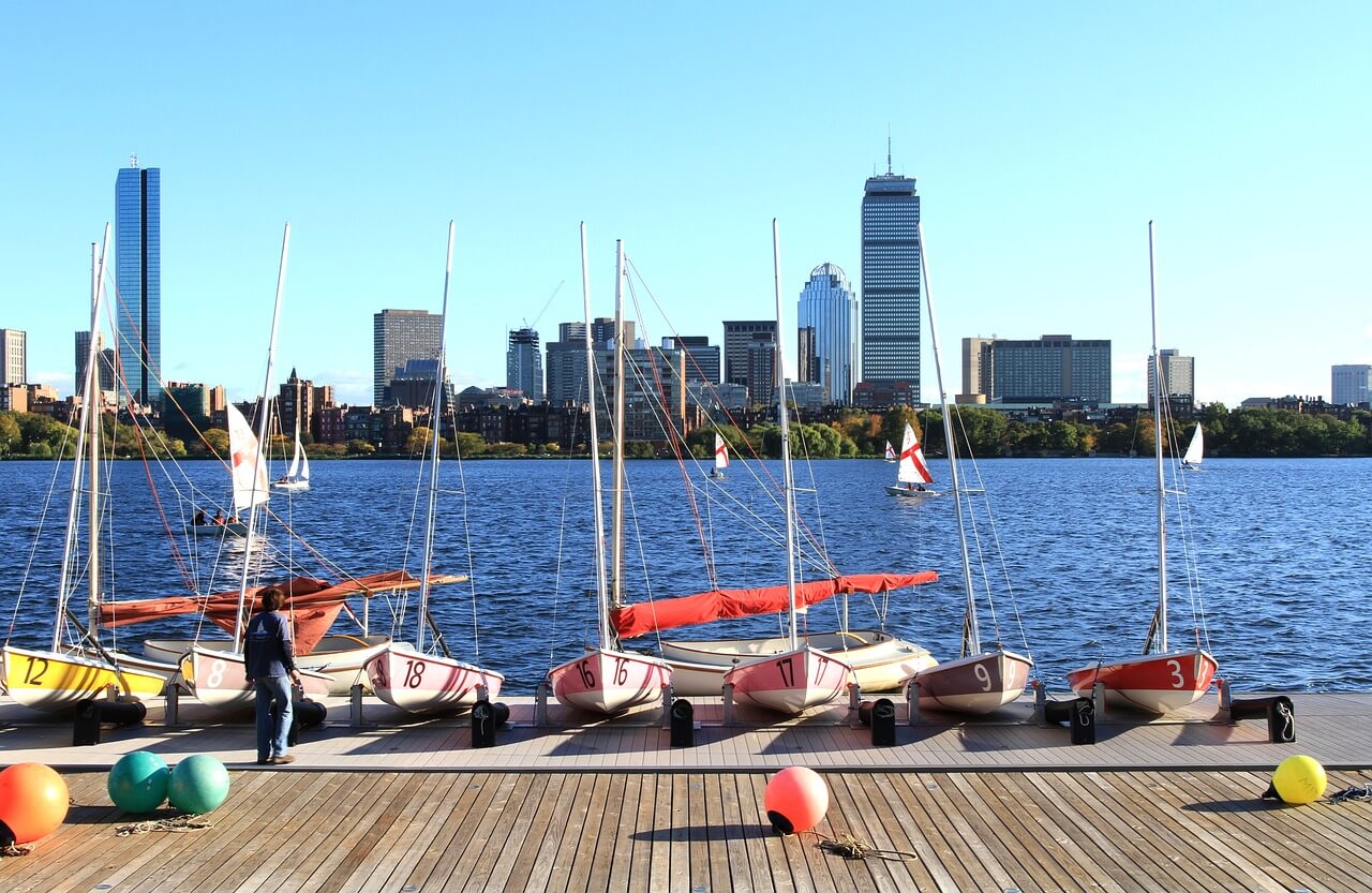 dock and sailboats and river in Boston, MA dock and sailboats and river in Boston, MA