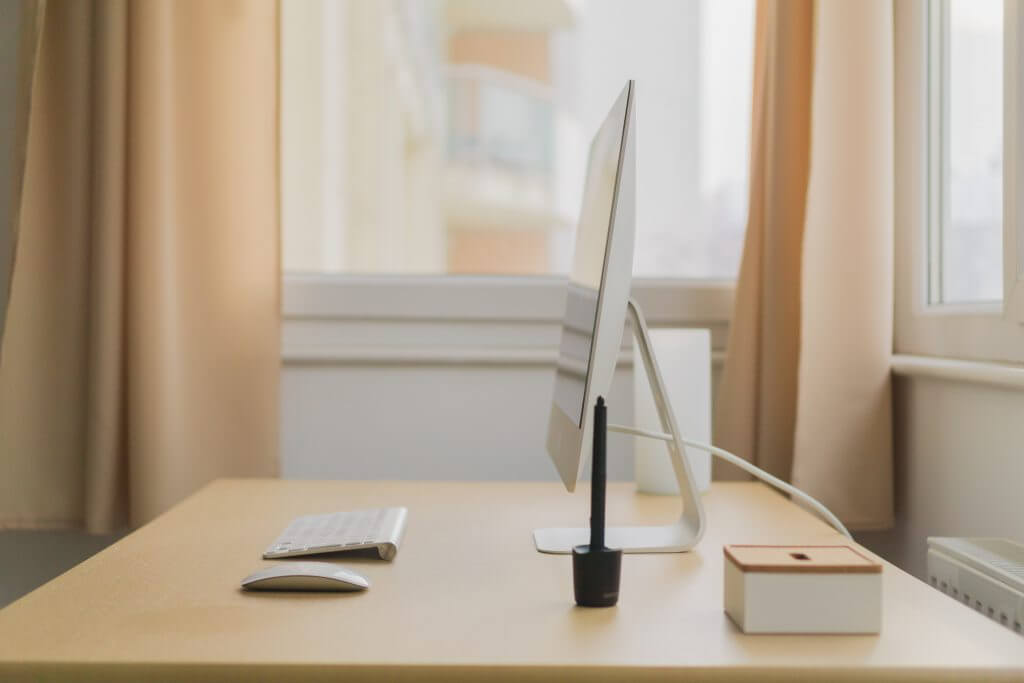 Computer desk with no people Computer desk with no people