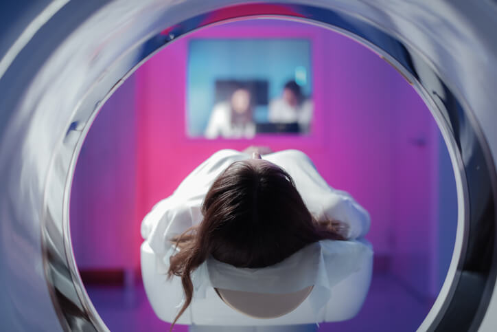 Patient in tomograph waiting for a scan Patient in tomograph waiting for a scan