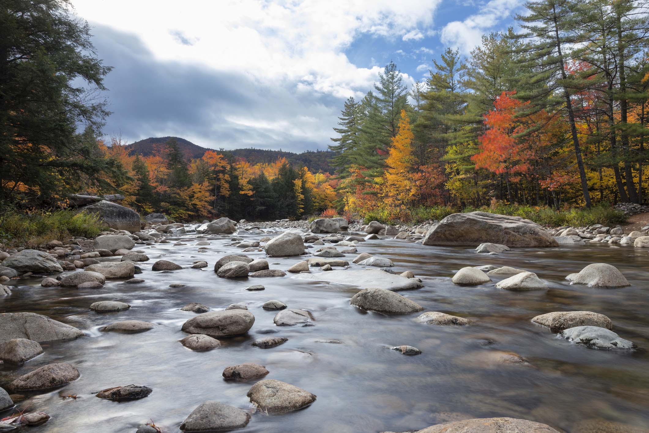 A shallow river with rocks in New Hampshire