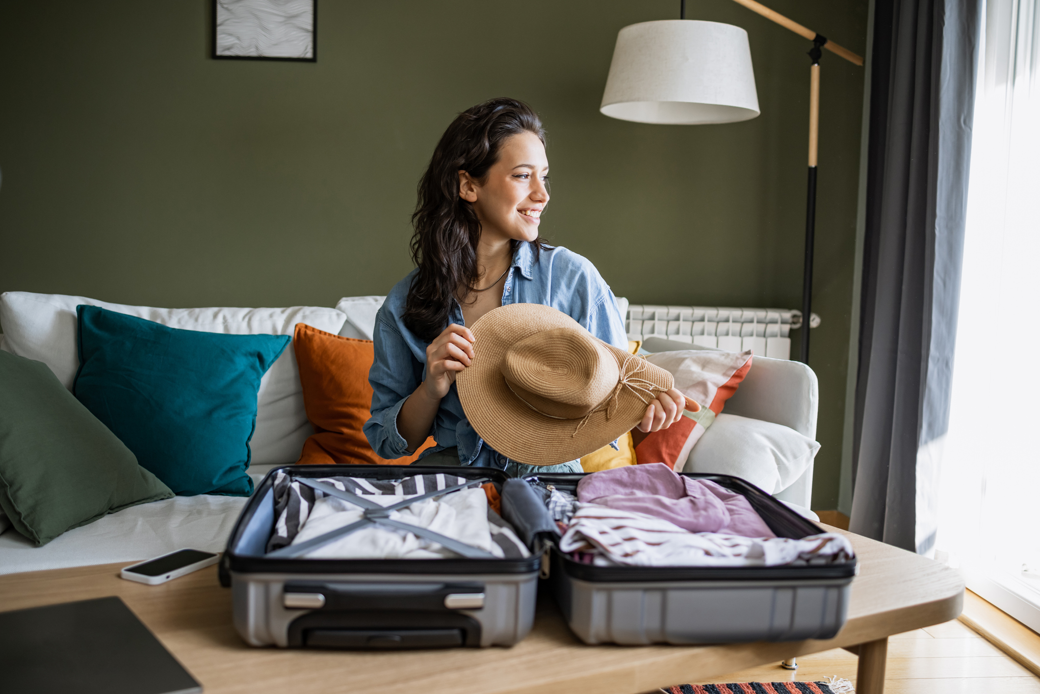 female traveler packing for trip