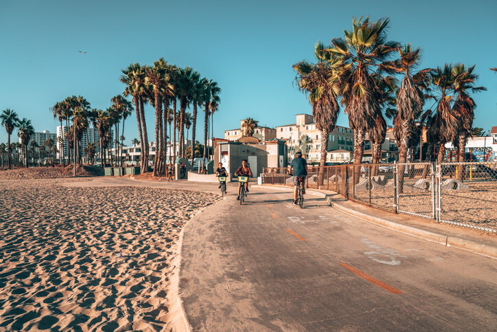 Beach boardwalk with bikes in California Beach boardwalk with bikes in California