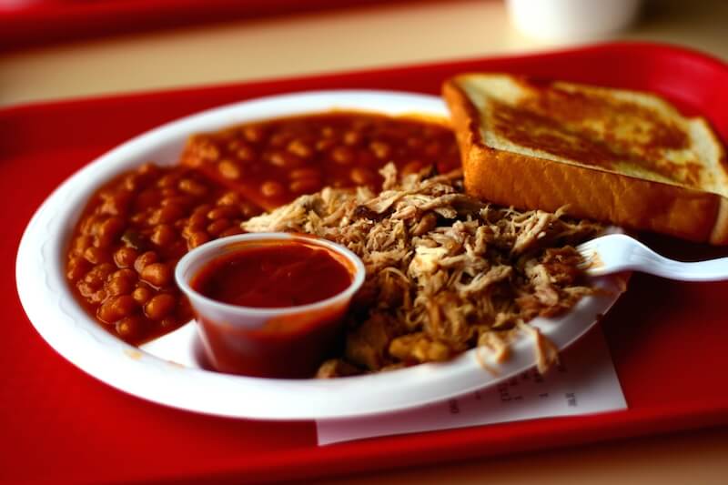 Plate of barbecue meat and beans Plate of barbecue meat and beans