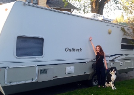 OT Traveler Alex Samson and her dog in front of her RV OT Traveler Alex Samson and her dog in front of her RV