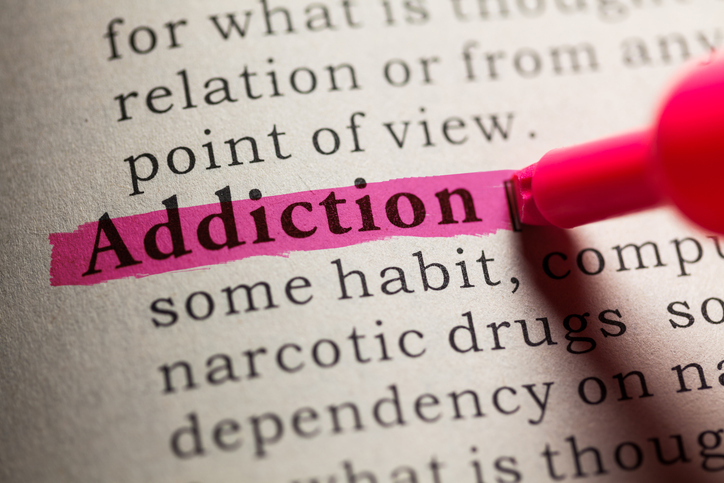 Word addiction highlighted in a text Word addiction highlighted in a text