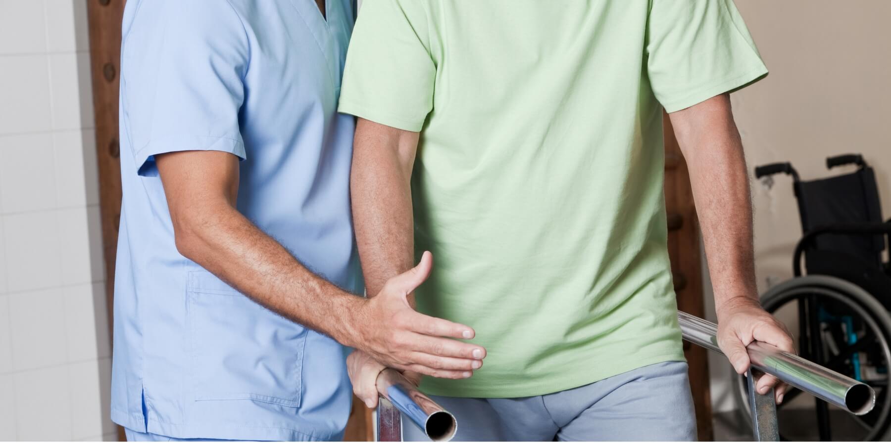 Physical therapist aiding in patient walking Physical therapist aiding in patient walking