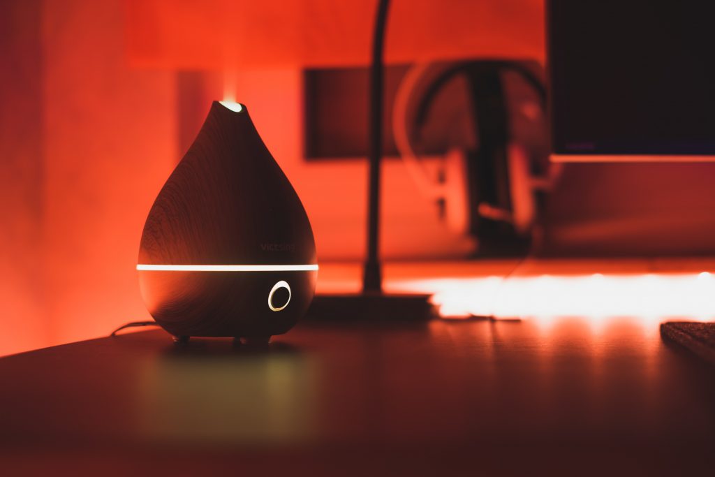 essential oil diffuser in room with red light essential oil diffuser in room with red light