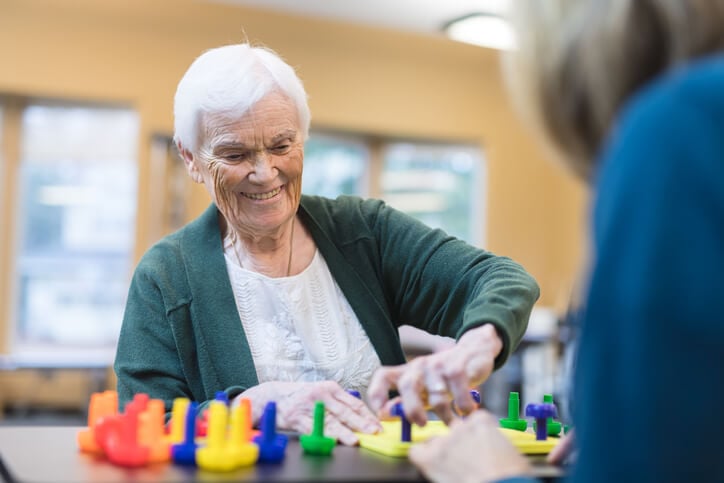 senior working with pegs senior working with pegs
