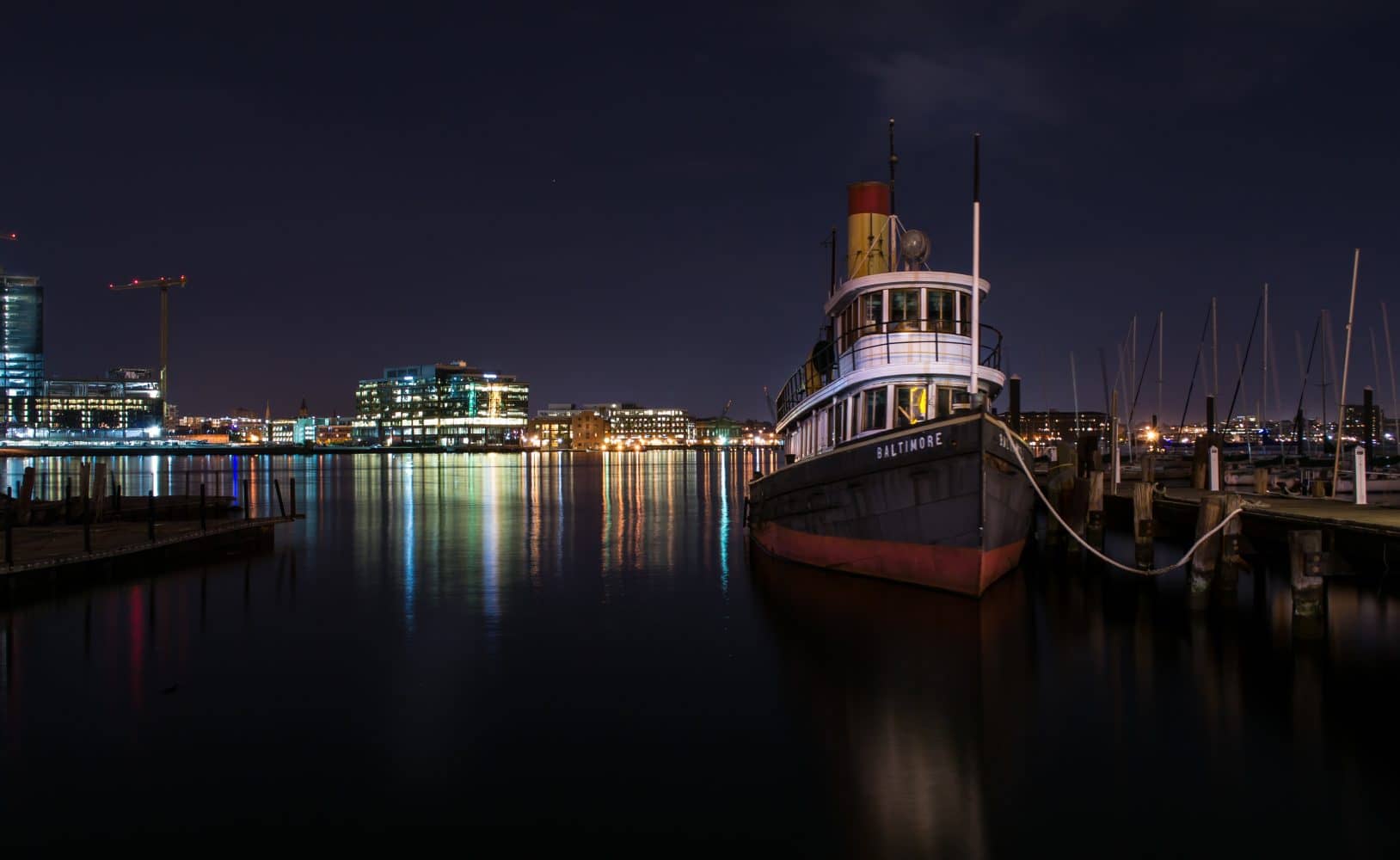 Baltimore Maryland boat on water at night Baltimore Maryland boat on water at night