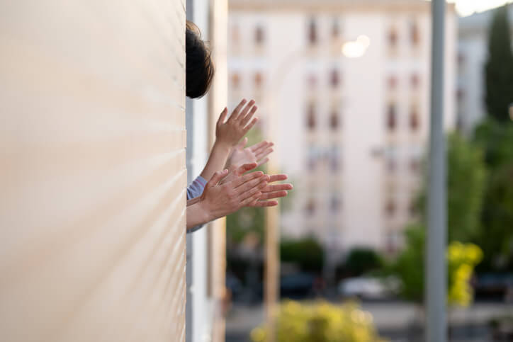 Hands outside window clapping Hands outside window clapping