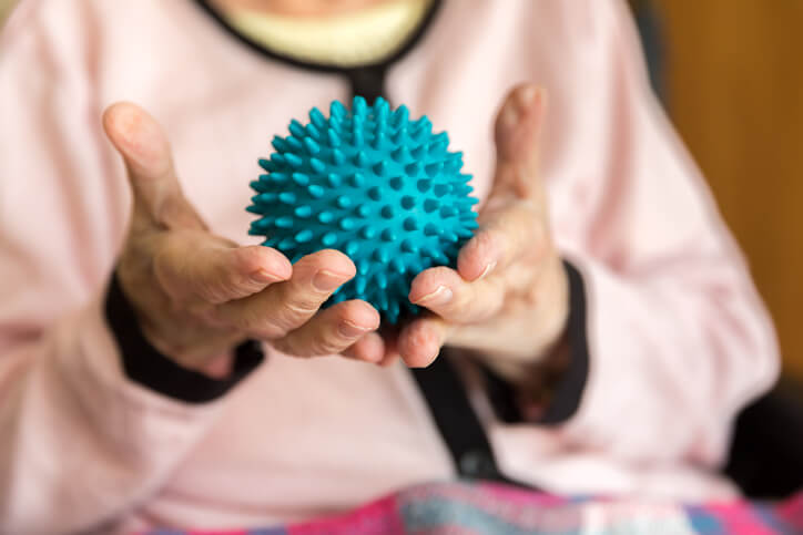 senior holding sensory ball senior holding sensory ball