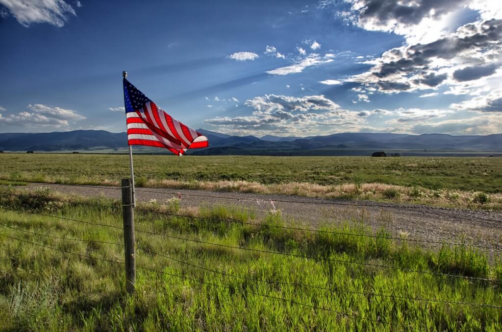 American flag in a rural lane American flag in a rural lane
