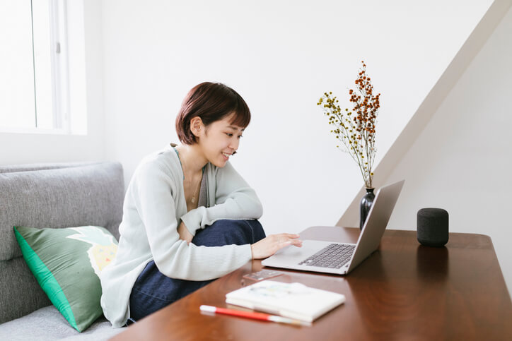 woman working remotely on laptop woman working remotely on laptop