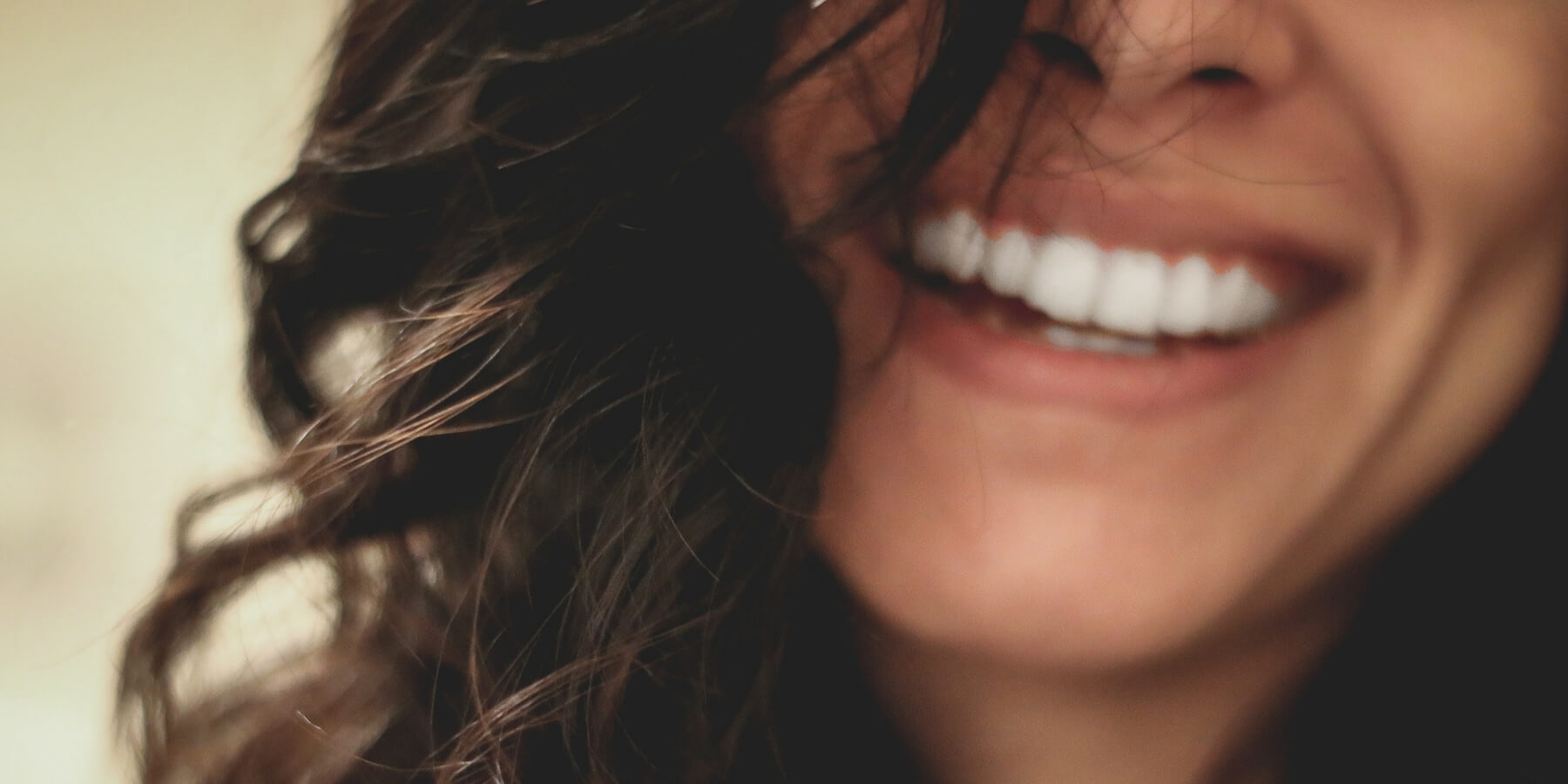 close up on woman's smile close up on woman's smile