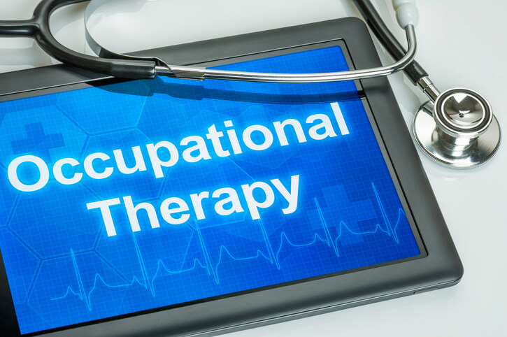 Tablet with words Occupational Therapy on it Tablet with words Occupational Therapy on it