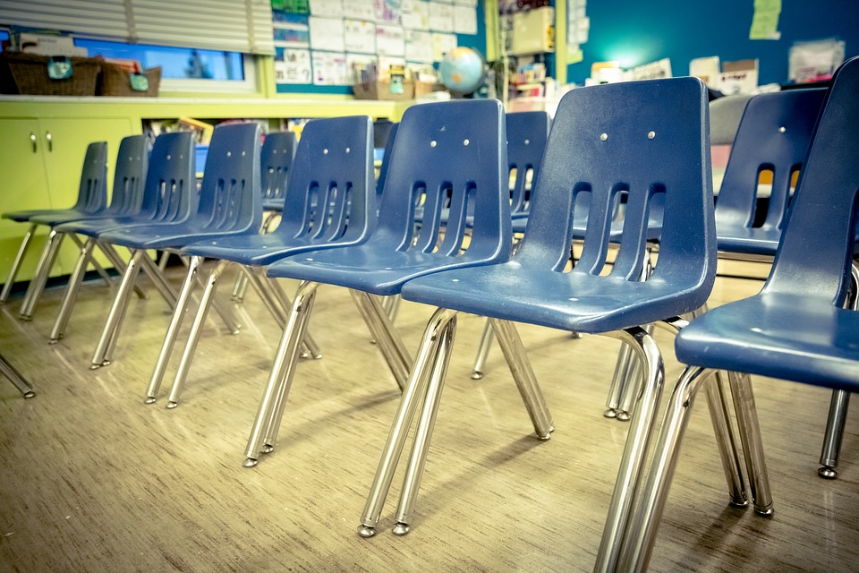 rows of empty chairs rows of empty chairs