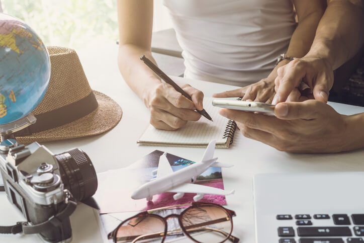 Couple planning vacation trip Couple planning vacation trip