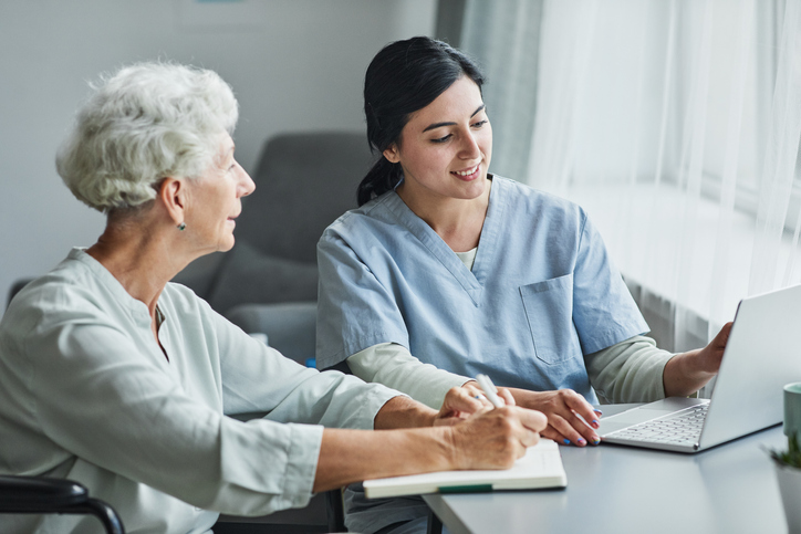 Social worker with patient Social worker with patient